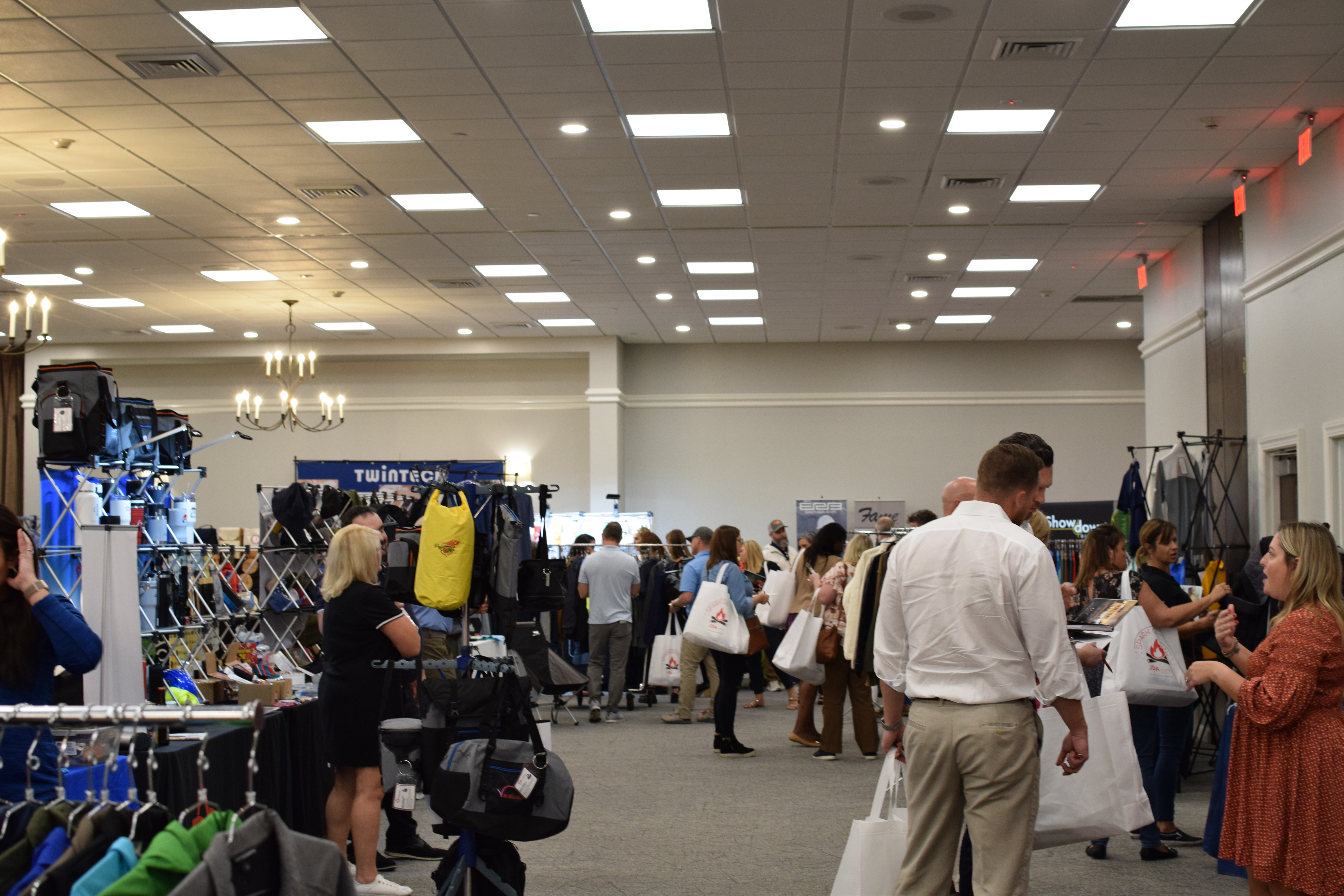Group shot of clients looking at promotional products vendors 